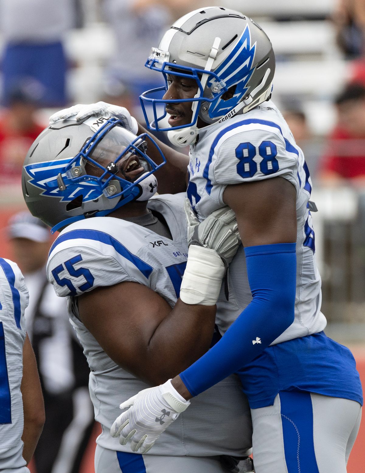Apr 2, 2023; Houston, TX, USA; St. Louis Battlehawks linebacker Dallas Carmack (55) celebrates wide receiver Hakeem Butler (88) the conversion against Houston Roughnecks in the second quarter at TDECU Stadium. 