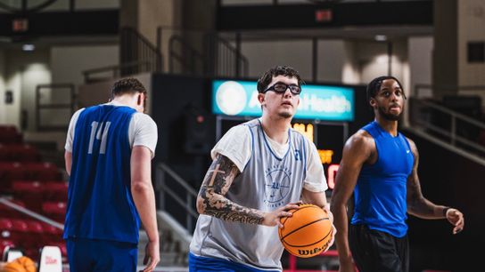 Robbie Avila (center), Kalu Anya (right) & Killian Brockhoff (left) shoot around before a Saint Louis away game Robbie Avila (center), Kalu Anya (right) & Killian Brockhoff (left) shoot around before a Saint Louis away game
