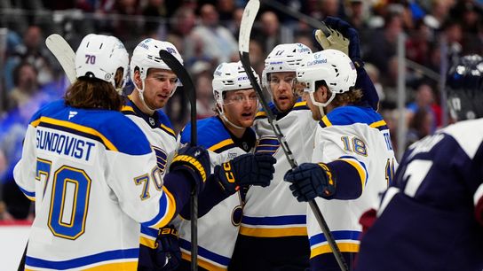 St. Louis Blues forward Zack Bolduc (76) celebrates his first-period goal with teammates Cam Fowler (17), Robert Thomas (18), Oskar Sundqvist (70), and Pavel Buchnevich (89) against the Colorado Avalanche at Ball Arena on March 29, 2025.