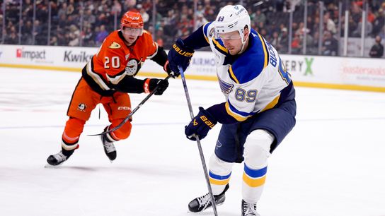 St. Louis Blues' Pavel Buchnevich controls the puck while Anaheim Ducks' Brett Leason gives chase during the first period at Honda Center. St. Louis Blues' Pavel Buchnevich controls the puck while Anaheim Ducks' Brett Leason gives chase during the first period at Honda Center.