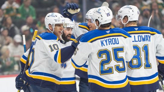 Brayden Schenn (10) of the St. Louis Blues celebrates with teammates after scoring a goal against the Minnesota Wild in the first period at Xcel Energy Center on March 15, 2025.