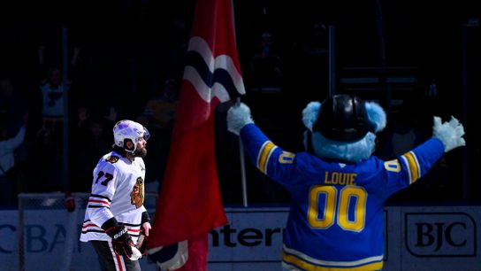 Chicago Blackhawks forward Patrick Maroon (77) salutes the crowd after being named the first star of the game in his final matchup against the St. Louis Blues at Enterprise Center.