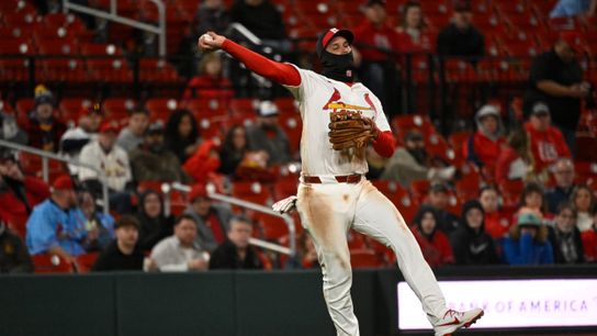 Nolan Arenado throws to first for an out against the Los Angeles Angels in the sixth inning at Busch Stadium on March 31, 2025.