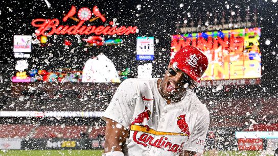 Cardinals shortstop Jose Barrero (27) gets a celebratory water dunk after St. Louis' win over the Pirates at Busch Stadium.