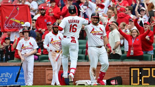 St. Louis Cardinals second baseman Nolan Gorman (16) celebrates with teammates at home plate after hitting a home run to right-center field in the seventh inning against the Minnesota Twins at Busch Stadium. March 30, 2025, St. Louis, Missouri.