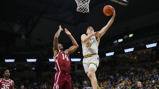 Feb 12, 2025; Columbia, Missouri, USA; Missouri Tigers guard Caleb Grill (31) shoots against Oklahoma Sooners forward Jalon Moore (14) during the first half at Mizzou Arena. Feb 12, 2025; Columbia, Missouri, USA; Missouri Tigers guard Caleb Grill (31) shoots against Oklahoma Sooners forward Jalon Moore (14) during the first half at Mizzou Arena.